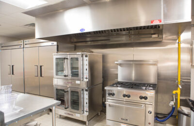 Stainless steel kitchen equipment at Head Start Easter Seals facility.