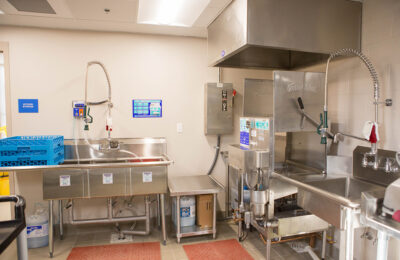 Stainless steel kitchen equipment at Head Start Easter Seals facility.
